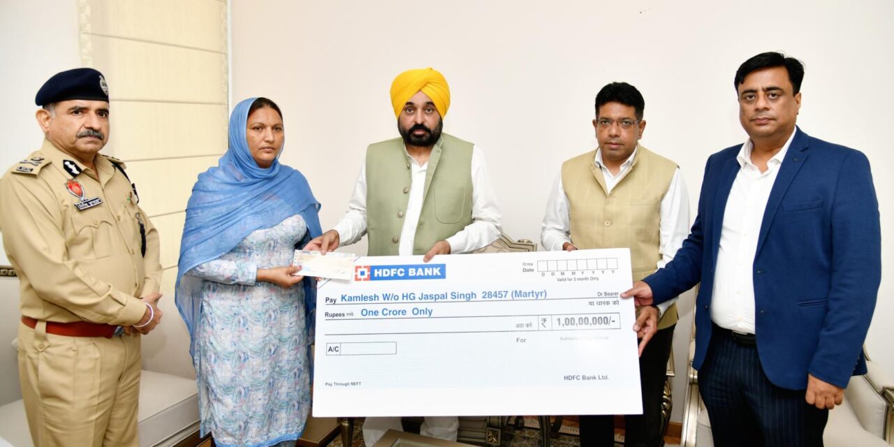 CM Bhagwant Mann hands over cheque of insurance worth Rs 1 crore to family of martyred Home Guard Jawan Jaspal Singh